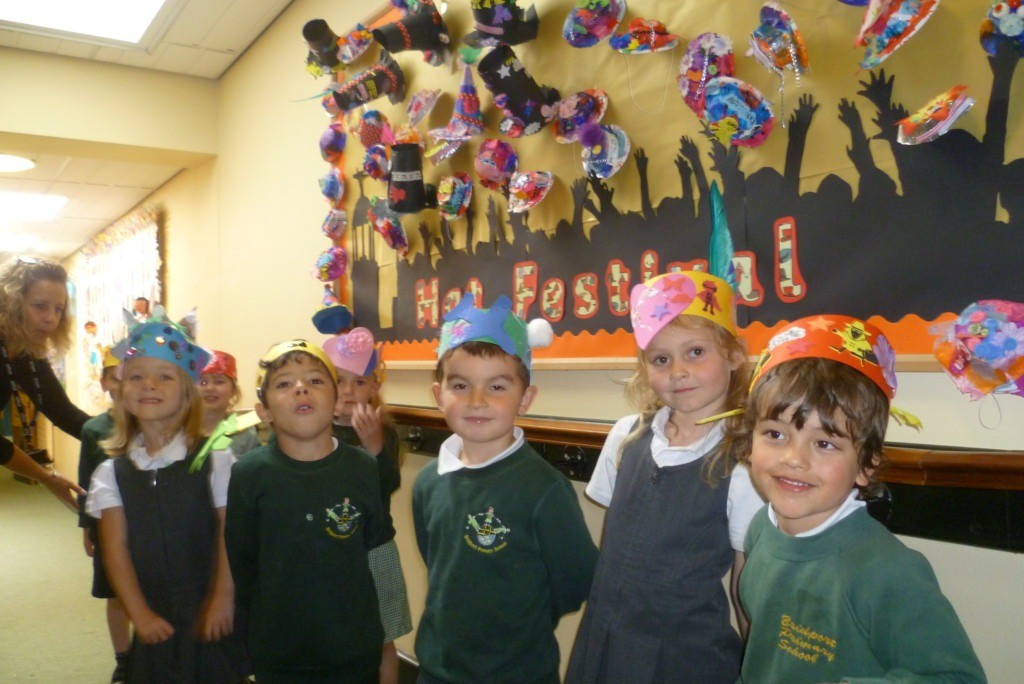 The Hat Festival collage with some youthful milliners and head teacher Debbie Brown assisting!
